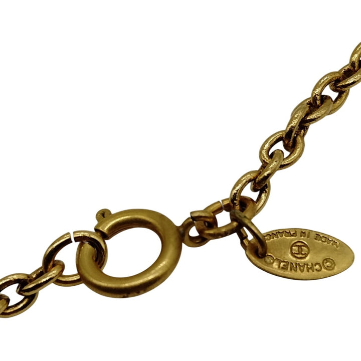 Chanel Vintage Coco Mark necklace with a Rhombus Pendant gold-plated metal.