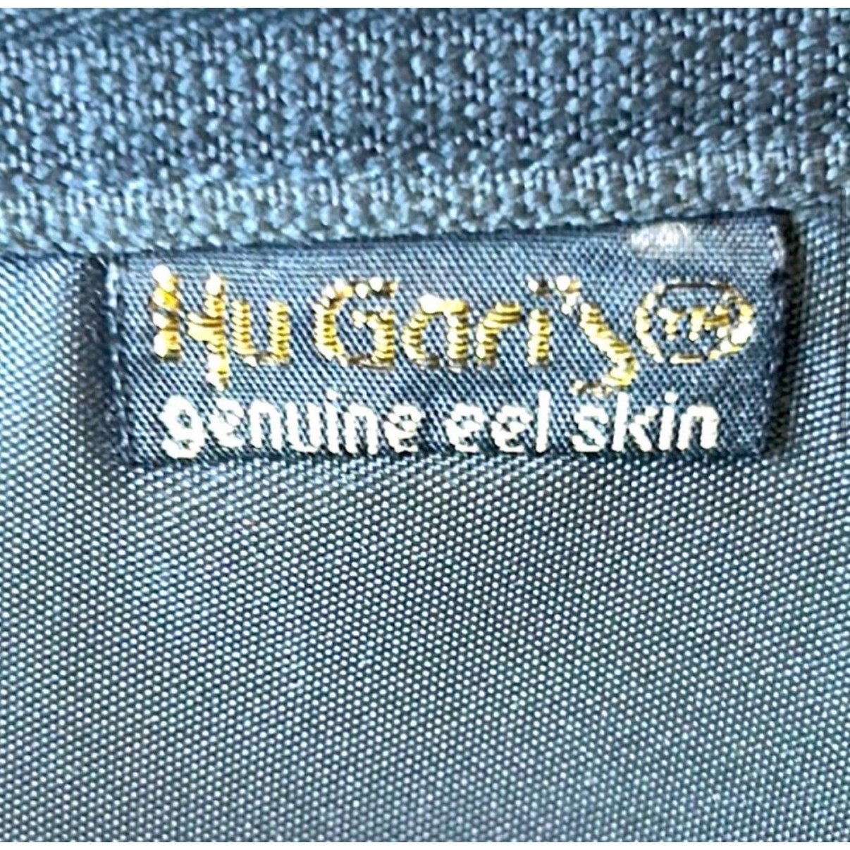 HU GARI’S KOREAN EEL SKIN CLUTCH NWOT - VERY UNIQUE