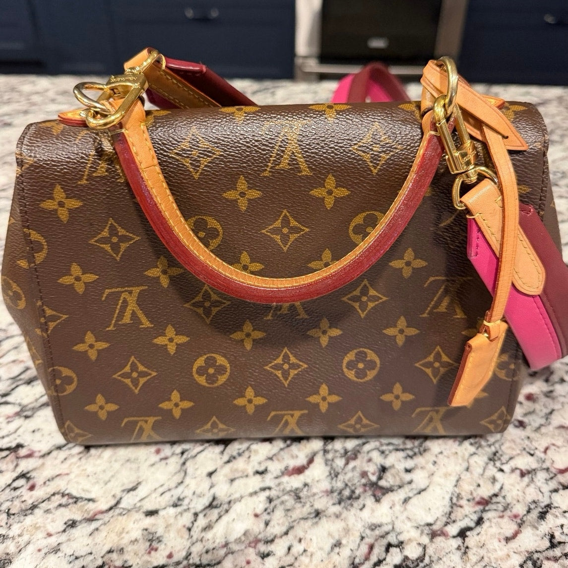 Louis Vuitton Monogram Cluny BB bag featuring a striking bright pink and bordeaux leather shoulder strap PRISTINE