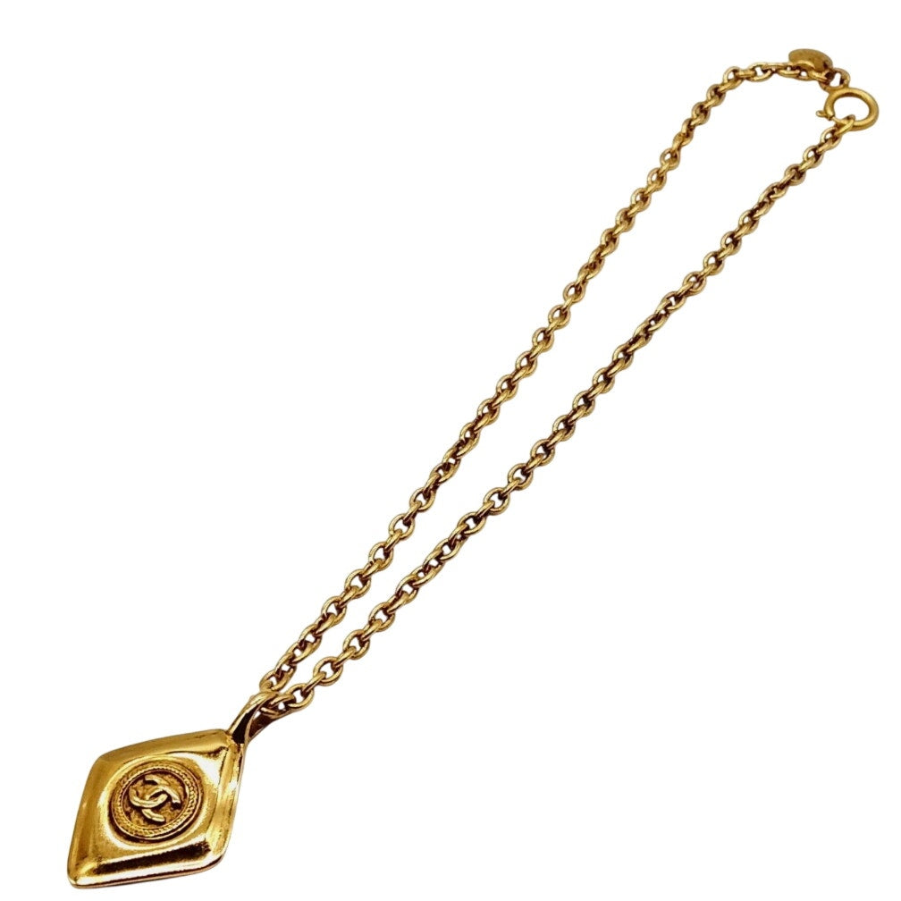 Chanel Vintage Coco Mark necklace with a Rhombus Pendant gold-plated metal.