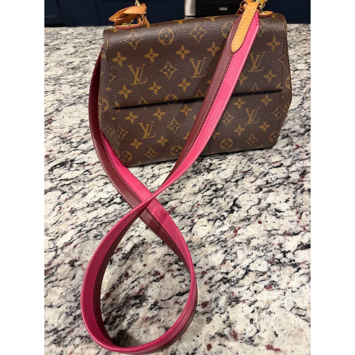 Louis Vuitton Monogram Cluny BB bag featuring a striking bright pink and bordeaux leather shoulder strap PRISTINE